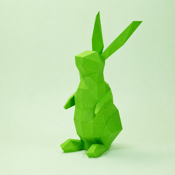 Groen konijntje van papier met twee rechtopstaande oren