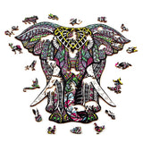 De Grijze Olifant Houten Puzzel (A3 formaat) - Majestueus Dier Figuurpuzzel van SlimSpul nederland b.v. toont een kleurrijke, deels voltooide olifant met unieke dierenfiguur stukjes en opvallende patronen op een witte achtergrond.