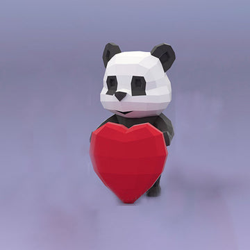 Zwart-witte panda met groot rood hart als 50 cm hoog geometrisch papiermodel