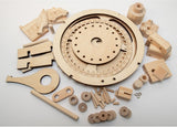 Ongemonteerde houten onderdelen zoals tandwielen, staven en blokken zijn gerangschikt op een wit oppervlak - ideaal voor het bouwen van de Tsjoek Tsjoek Trein Houtconstructie - Bewegend Kindermodel (Timberkits Beginner) van SlimSpul nederland b.v.