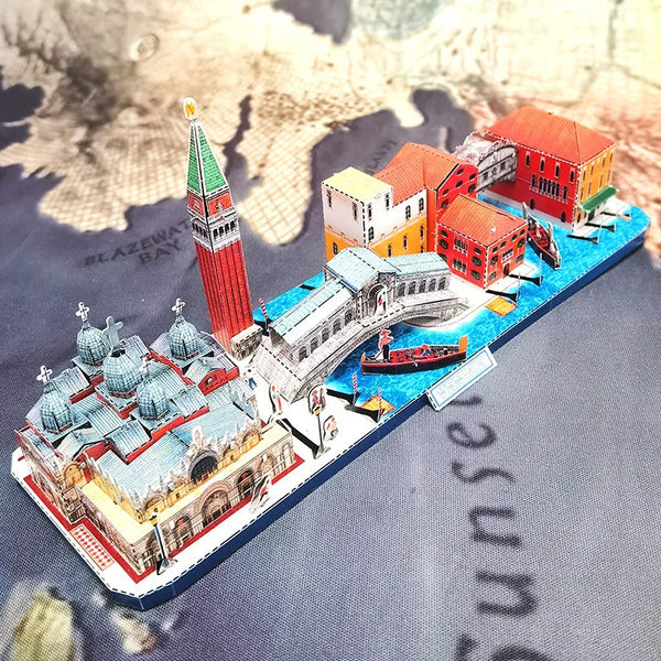 De Stadsgezichten Metalen Bouwpakket (Diverse Steden) - Architectuur Miniaturen van SlimSpul nederland b.v. is een prachtig verzamelobject met iconische gebouwen, grachten en gondels die de charme van Venetië in miniatuur weergeven.