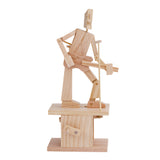 De Gitarist Houtconstructie Bouwpakket - Tokkelend Bewegend Model van SlimSpul nederland b.v. is een licht houten doe-het-zelf bouwpakket waarin een figuurtje gitaarsnaren slaat, perfect voor hobbyisten en modelbouwliefhebbers.